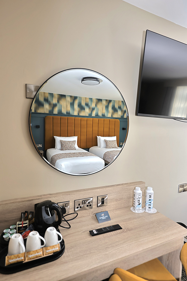 Hotel room mirror and desk